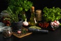 Marble mortar and pestles with herbs garlic and pepper Royalty Free Stock Photo