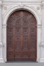 Marble portal in Gothic-Renaissance style of the dome in Montagnana, Italy.