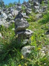 A marble pyramid built on the slope of the White Mountain to fulfill a wish in the Ruskeala Mountain Park on a sunny summer day Royalty Free Stock Photo