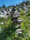 A marble pyramid built on the slope of the White Mountain to fulfill a wish in the Ruskeala Mountain Park on a sunny summer day Royalty Free Stock Photo