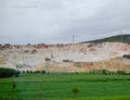 Marble quarry quarrying white marble in open pit Royalty Free Stock Photo