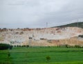 Marble quarry quarrying white marble in open pit Royalty Free Stock Photo