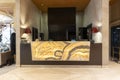 Marble reception desk in hotel lobby