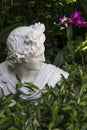 Marble roman-style bust statue of young man in profile