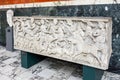 Marble sarcophagus with ornate relief sculpturing