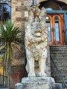 A marble sculpture of a lion with an eagle on the back at the Larnach castle on Otago peninsula in New Zealand