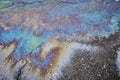 Marble spills on the water from stains of gasoline and oil. Abstract background from motor oil, gas or petrol spilled on Royalty Free Stock Photo