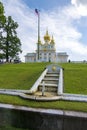 Marble stair fountain and East chapel of Grand Peterhof Palace in Petrodvorets, Saint Petersburg, Russia