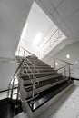 Marble staircase with a steel handrail