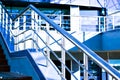 Marble staircase with a steel handrail