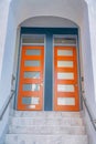 Marble stairs leading to the two front doors with glass panes and transoms in San Francisco, CA Royalty Free Stock Photo