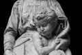 Marble statue a child with her mother Royalty Free Stock Photo