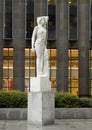 Marble statue of a classic female figure by Marton Varo in front of the Plaza of the Americas