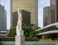 Marble statue of a classic female figure by Marton Varo in front of the Plaza of the Americas Royalty Free Stock Photo