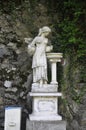 Statue on the Old Road in the forest from Baile Herculane Resort in Romania Royalty Free Stock Photo