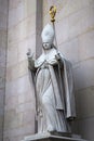 Marble statue of Saint Rupert in the facade of the Dome Cathedral in City Center of Salzburg, Austria