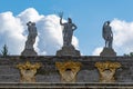 Marble statues of ancient roman gods Triton, Neptun and Bacchus at the top of Golden Hill Cascade in Peterhof museum in Saint