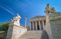 Marble statues of Plato and Socrates, ancient Greek philosophers, in chairs, main entrance to Academy of Athens