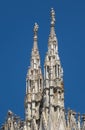 Marble statues on top of cathedral roof