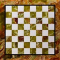 Marble stone chess board - top view of an elegant and old chess table empty
