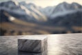 Marble stone pieces with blurred landscape background for product display, rough geometric rock shapes.