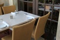 Marble table and cane chairs Royalty Free Stock Photo