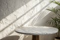 Marble table with stucco wall and light beam Royalty Free Stock Photo