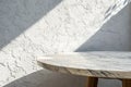 Marble table with stucco wall Royalty Free Stock Photo