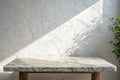 Marble table with stucco wall Royalty Free Stock Photo