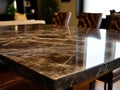 A marble table top in a dining room with brown leather chairs Royalty Free Stock Photo