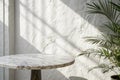 Marble table with white stucco wall and light beam Royalty Free Stock Photo