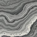 Marble texture with intricate, wavy striations in varying shades of black and gray. The Royalty Free Stock Photo