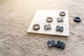 Marble Tic Tac Toe or OX board game on soft carpet with copy space. concept of strategy, risk, competition in business Royalty Free Stock Photo