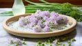 Marble tray holds freshly cut chive blossoms