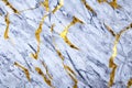 Marble wall surface with random texture and gold veins. Royalty Free Stock Photo