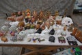 Marble and Wooden Indian Figurines for sale outside a tourist street market in India. Buddha figurines and shiva. Elephant, Royalty Free Stock Photo