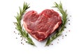 marbled beef steak like heart shape and rosemary hearb isolated on white background