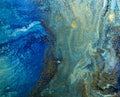 Marbled blue and golden abstract background. Liquid marble pattern