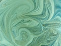 Marbled blue, green and golden abstract background. Liquid marble pattern Royalty Free Stock Photo