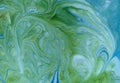 Marbled blue, green and golden abstract background. Liquid marble pattern Royalty Free Stock Photo