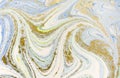 Marbled blue, white and gold abstract background. Liquid marble pattern.