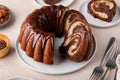 Marbled bundt cake sliced on a plate, chocolate and vanilla marble cake with chocolate glaze Royalty Free Stock Photo