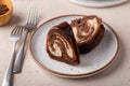 Marbled bundt cake sliced on a plate, chocolate and vanilla marble cake with chocolate glaze Royalty Free Stock Photo