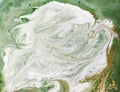 Marbled green and golden abstract background. Liquid marble pattern.