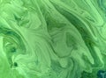 Marbled green and golden abstract background. Liquid marble pattern