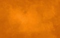 Marbled orange background in warm autumn halloween colors