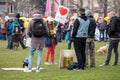 7 March, 2021, Amsterdam, Netherlands, Yellow umbrella`s protest against covid-19 measures and vaccination