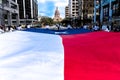 MARCH 3, 2018 - AUSTIN TEXAS - University of Texas students carry Texas flag down Congress Avenue. 2, Texas