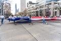 MARCH 3, 2018 - AUSTIN TEXAS - University of Texas students carry Texas flag down Congress Avenue. AustinVertical, EventAustin