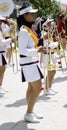 March band girl holding a trumpet